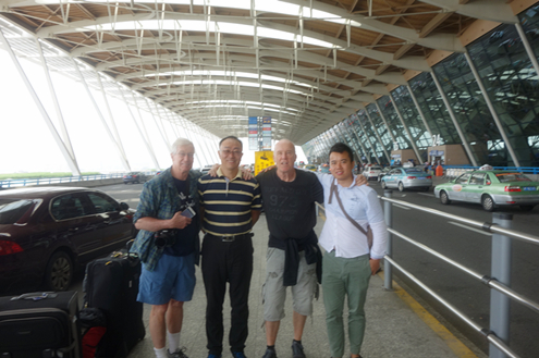 Photo with the driver and tour guide in Shanghai