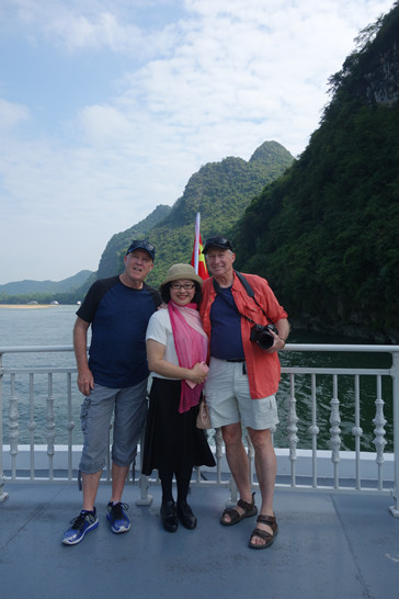 Myself, a tourist, and Jay on the Li River